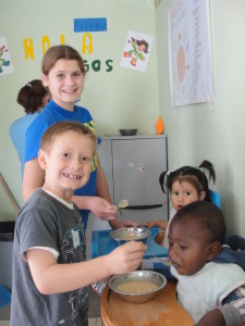 Olivia and Jack - brother and sister - serving soup to the babies and toddlers