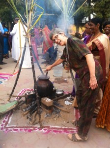Mary stirring the pot of Pongal