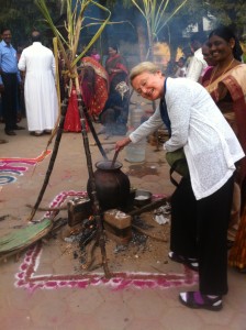 Marietta stirring the pot of Pongal