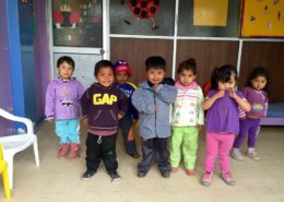 Volunteer with children in Ecuador