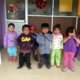 Volunteer with children in Ecuador