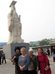 Volunteer Jo Carol and Carolyn with their host teachers at Terracotta Warriors Museum