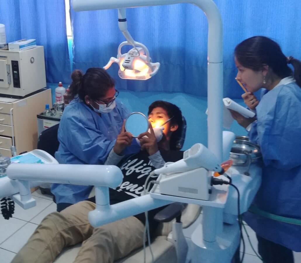 Volunteer Chetna Rana provides dental care to the children
