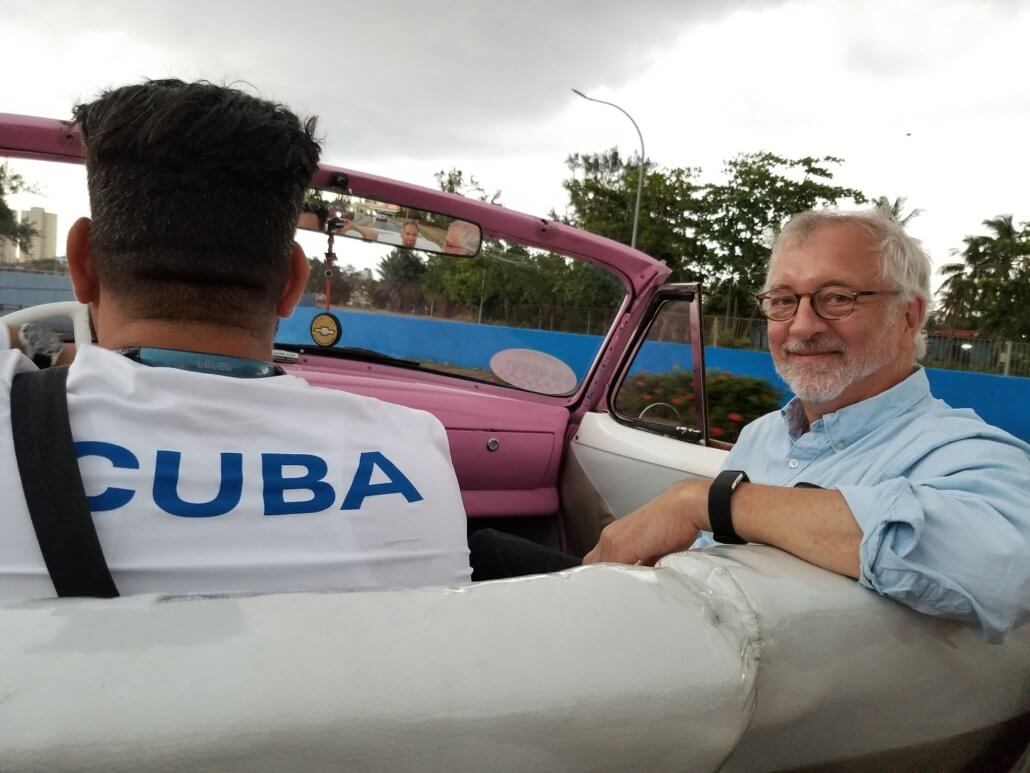 Peter enjoys the ride in one of Havana's classic cars, a 1954 Chevy