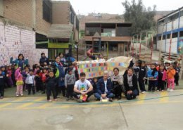 Children thank volunteers aborad for support sagrada familia lima peru