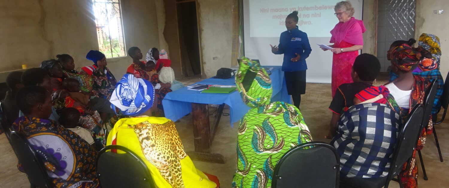 volunteer abroad conducting moms workshop in Tanzania