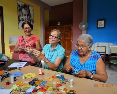Volunteer abroad works with ladies at a sewing circle in Ciego de Avila, Cuba.