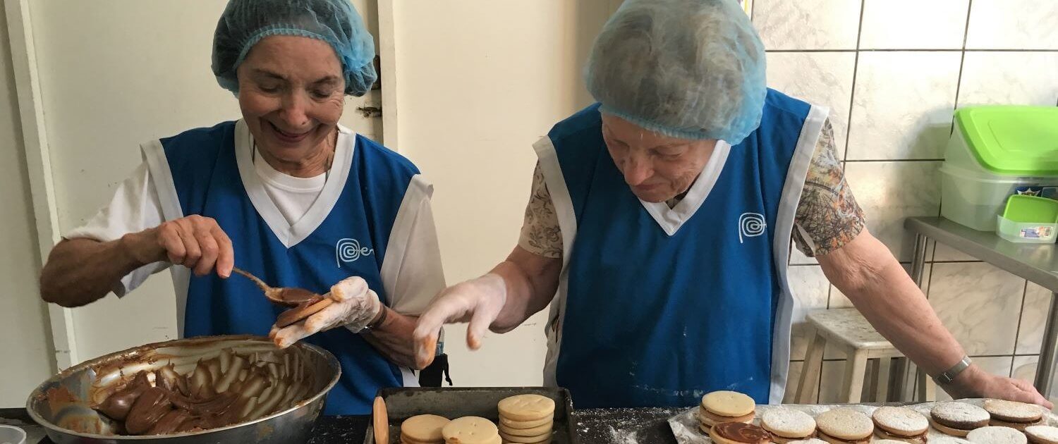 volunteer-abroad-Mary-Villa-and-Nancy-Schultz-having-fun-at-the-kitchen-at-ppa-peru-1