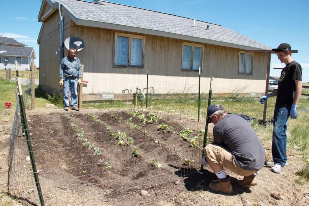 volunteers building fence blackfeet reservation montana