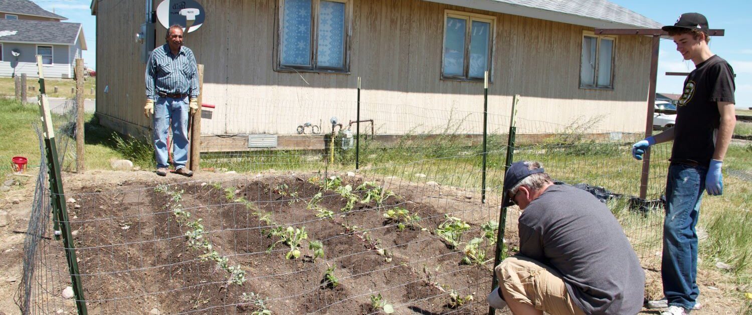 volunteers building fence blackfeet reservation montana