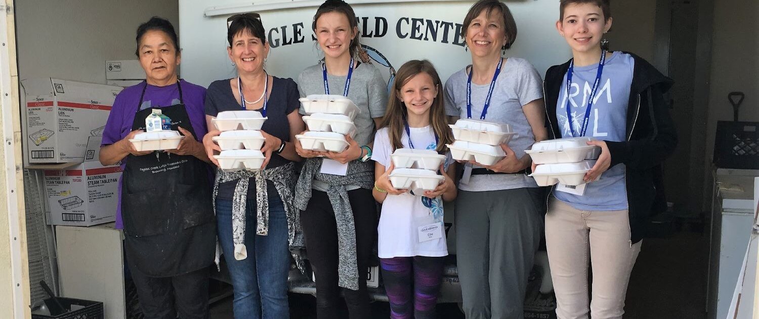 Volunteers help deliver meals to home-bound elders on the Blackfeet Indian Reservation.