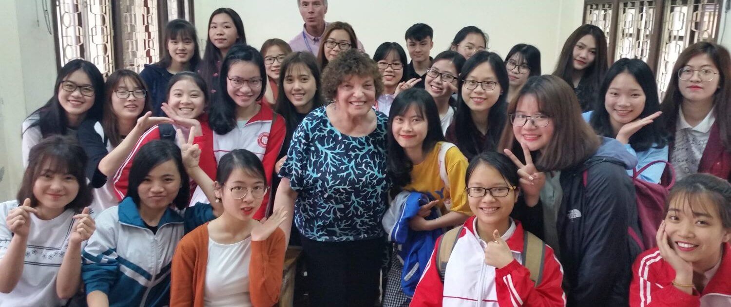 volunteer abroad with her students at the foreign trade university hanoi vietnam
