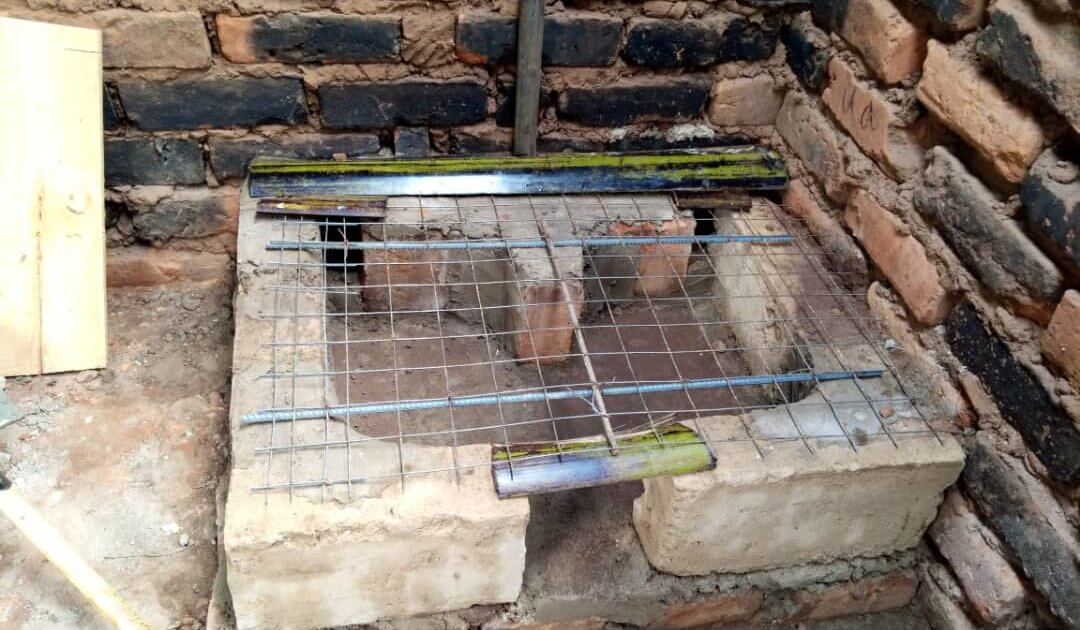 The fuel-efficient stove Global Volunteers builds in Tanzania relies on locally available materials.