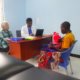 volunteer Procerfina Kebabian working with the doctor at the clinic tanzania
