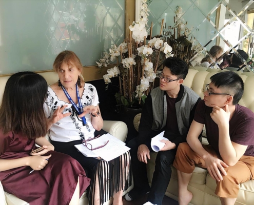Volunteer-teaching-English-to-the-staff-at-Blind-Links-Omamori-Spa- vietnam