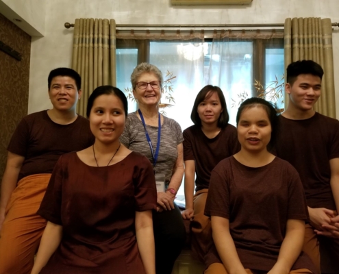 Volunteer works at Omamori Spa in Vietnam, helping students and staff them approve their English course.