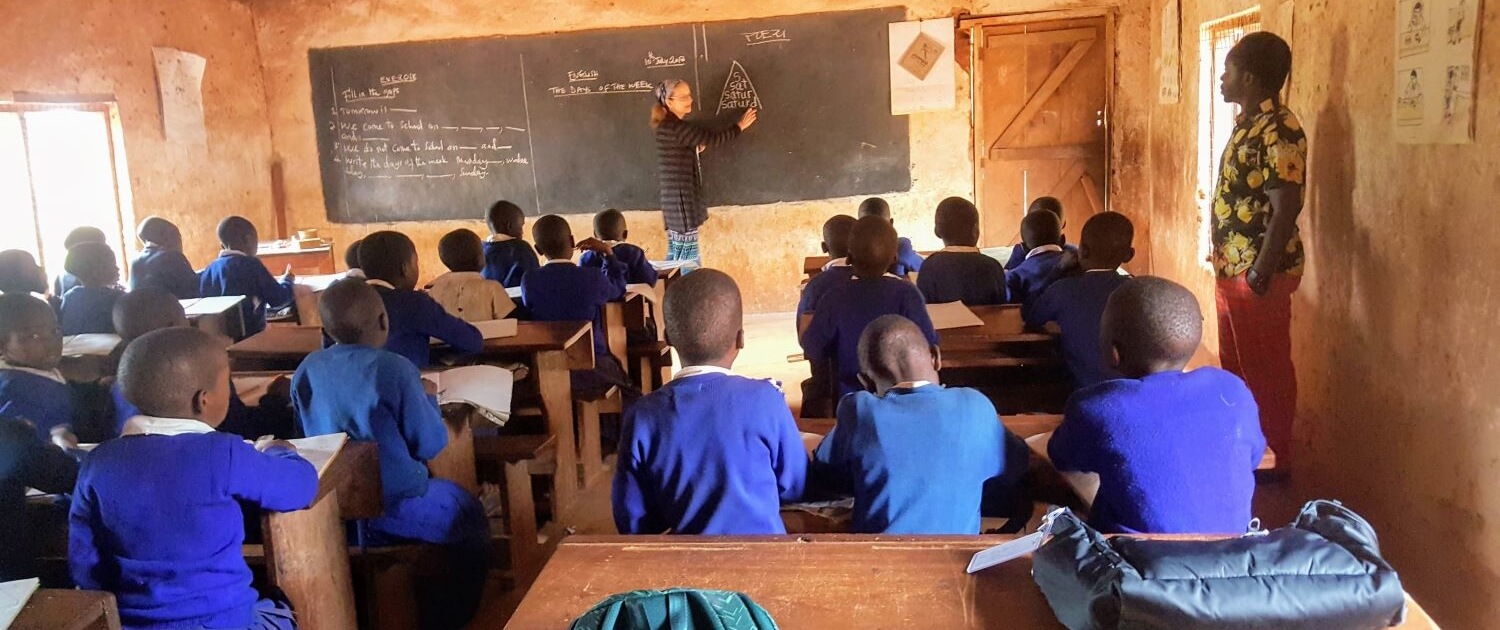 Volunteer teaches at a primary school in Mkalanga, Tanzania. 