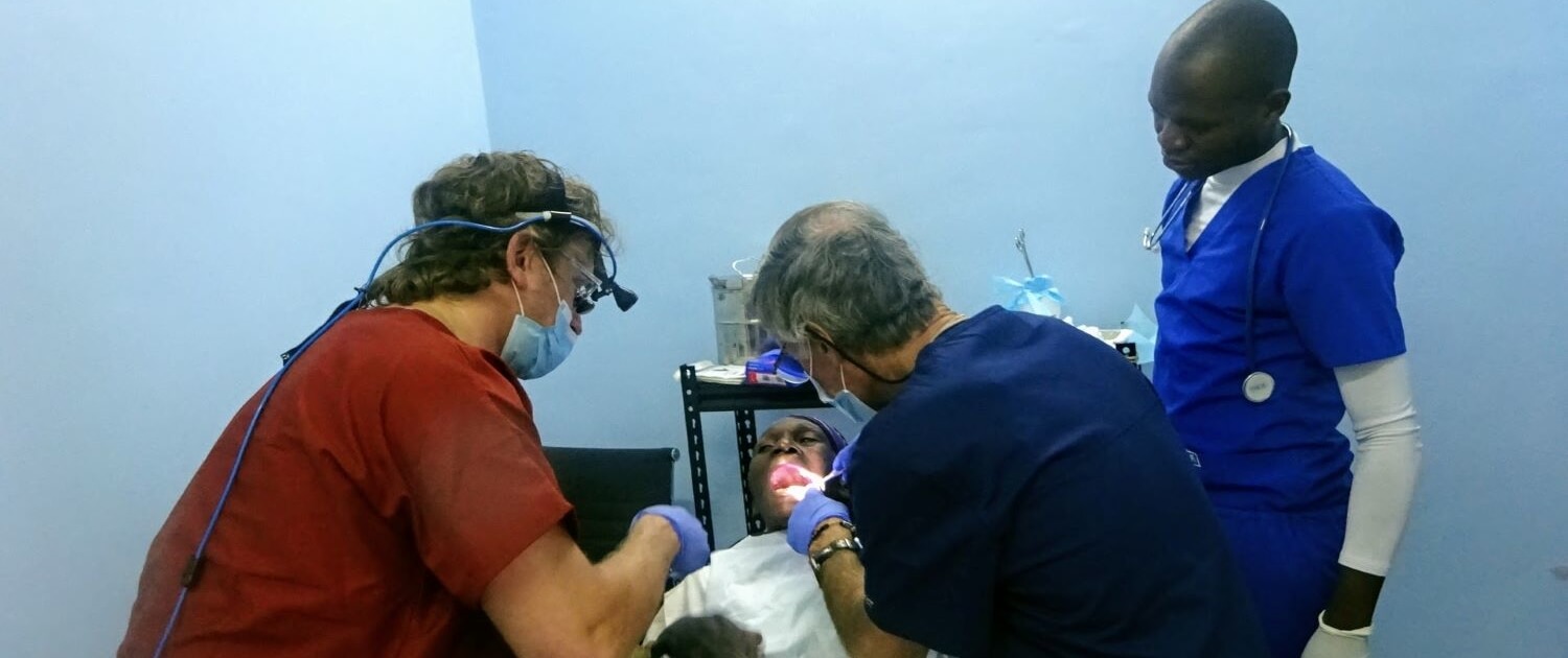 Volunteers Bryan Aungst and Nelson Goodman performed several tooth extractions when they served in Tanzania. 