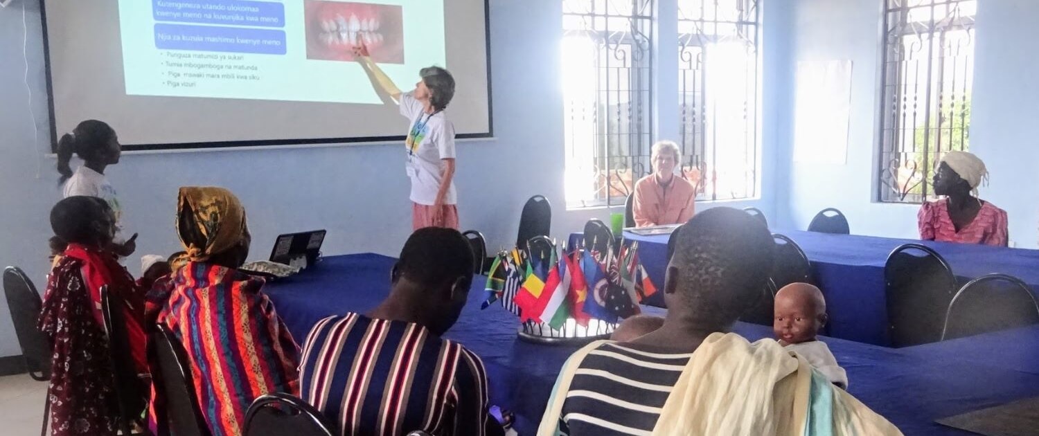 Volunteer Christine Edner conducted a workshop on dental health for RCP moms in Tanzania.