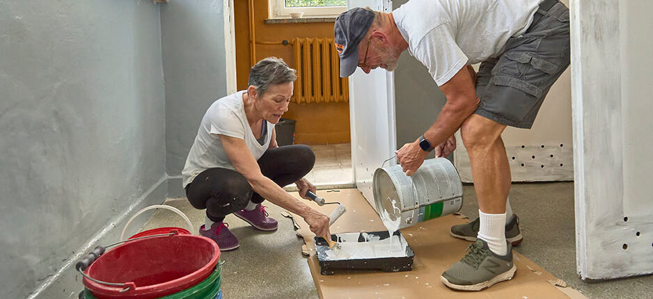 Volunteers paint walls in a preschool converted for a home for Ukrainian refugees in Poland.