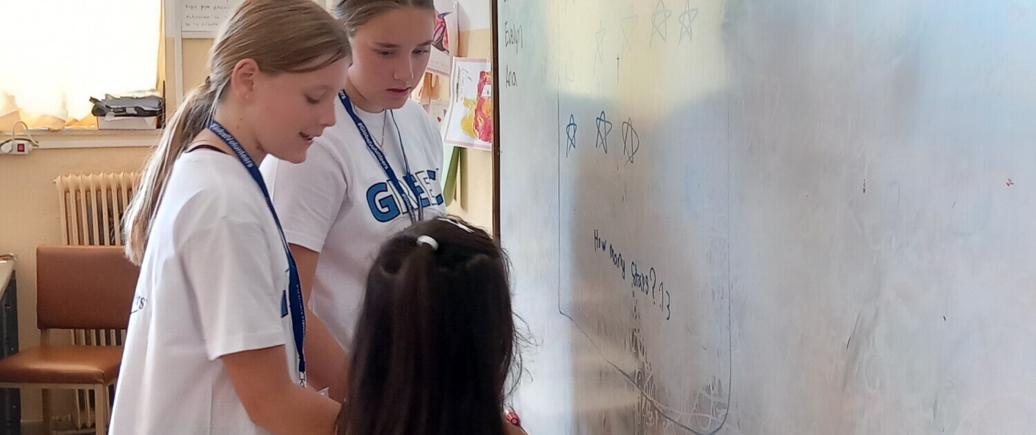 Evelyn & Stella Bly teaching conversational English in the summer English day camp in Greece