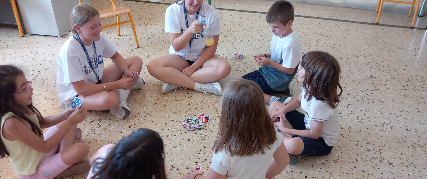 Evelyn and Stella Bly with 2nd grade students volunteering in Greece