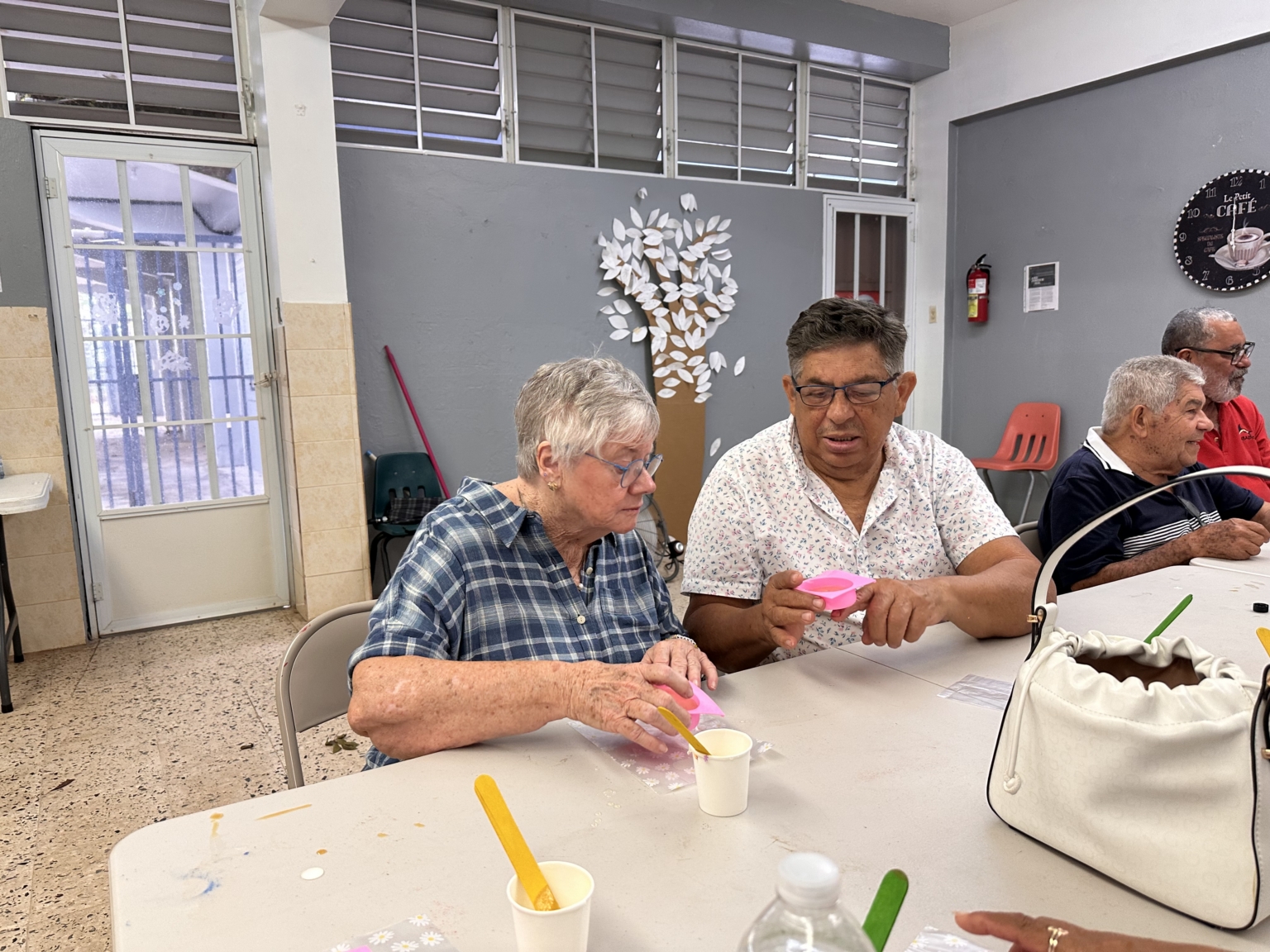 Puerto Rico volunteer Lolli Sumberg making soap with a local person